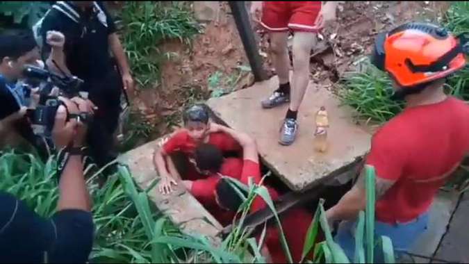 No país: Menino é resgatado após cair em córrego ao tentar salvar cachorro