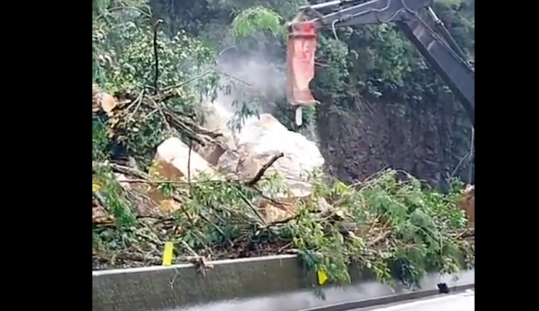 (Vídeo) Equipes atuam na limpeza no Morro dos Cavalos e filas chegam a 9 km na BR-101