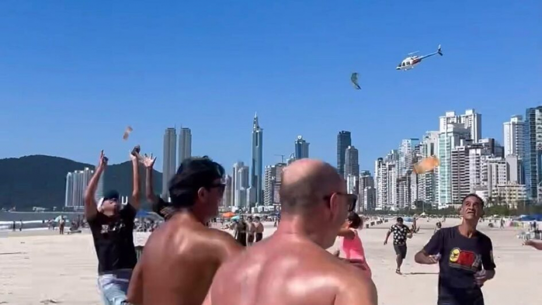 'Chuva de dinheiro' de influenciadora digital gera tumulto em Balneário Camboriú