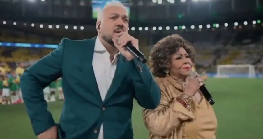 (Vídeo) Belo e Alcione recebem críticas após apresentação do Hino Nacional antes de amistoso da Seleção